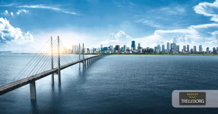 En bro över ett hav och Trelloborg AB:s logga