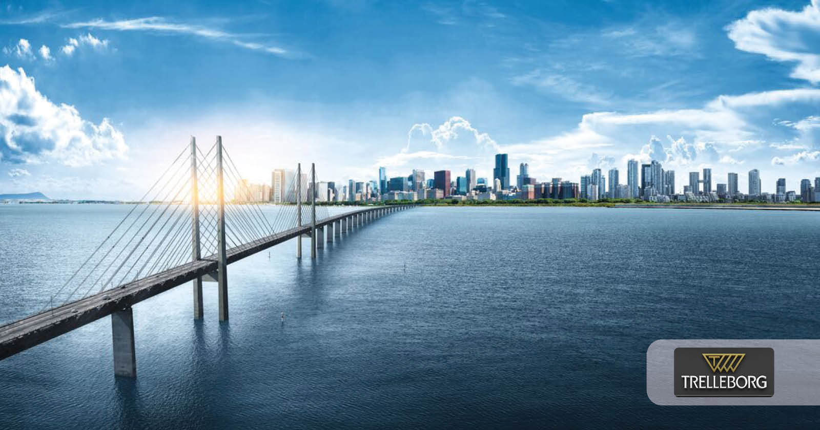 En bro över ett hav och Trelloborg AB:s logga